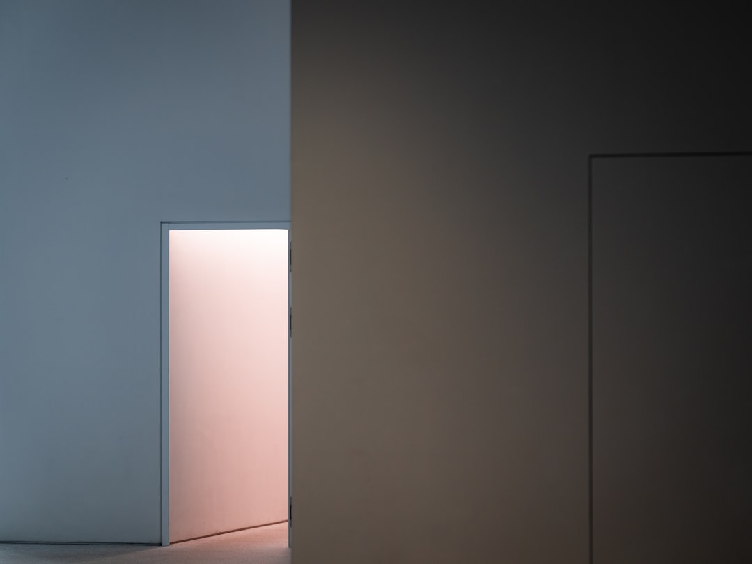 A door standing open to warm light