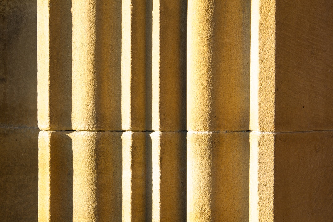 A colonnade wall, read in close detail